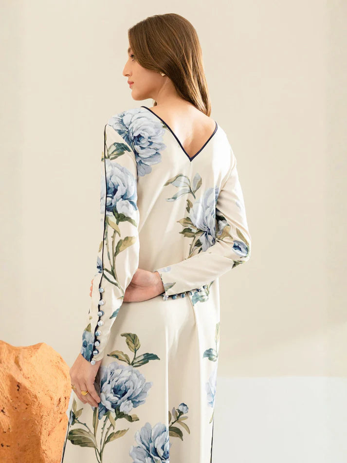 Woman wearing a floral dress with a neutral background